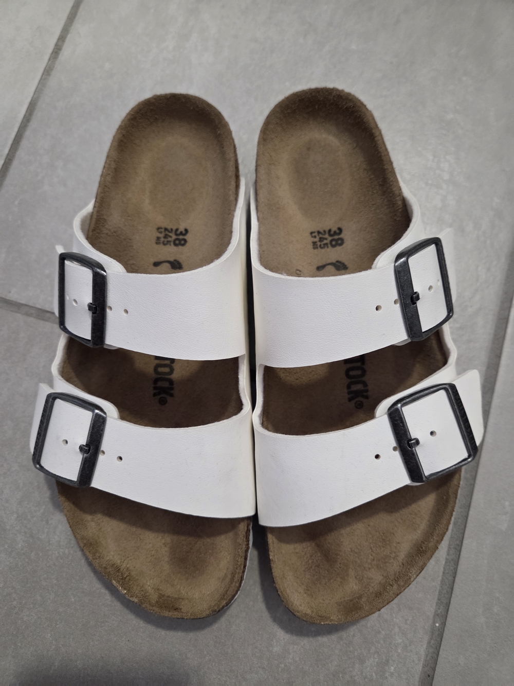 Birkenstock White Double-Strap Sandals with Black Buckles